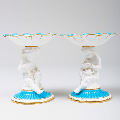 Pair of Minton Porcelain Compotes with Putti Supports