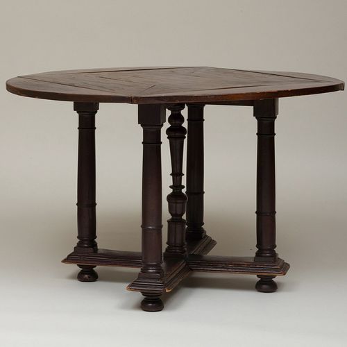 Italian Renaissance Style Walnut Drop-Leaf Center Table