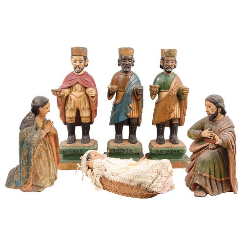Adoración de los Reyes. México, finales del SXIX. Madera tallada y policromada. Piezas: 6