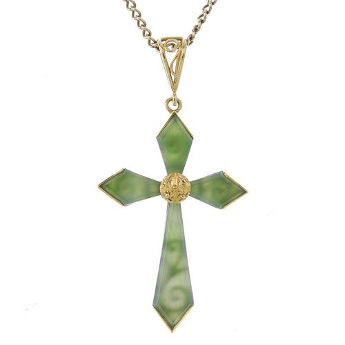 A nephrite jade cross pendant. The nephrite jade cross, to the openwork surmount, suspended from a c
