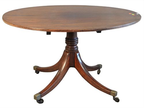 George III Mahogany Breakfast Table, having oval top and brass capped feet, circa 1800, height 28 inches, top 35" x 47 1/2".