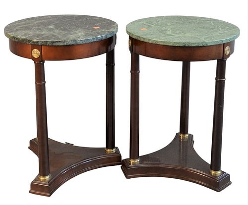 Pair of Empire Style Round Tables, having marble tops, height 25 inches, diameter 18 inches.
