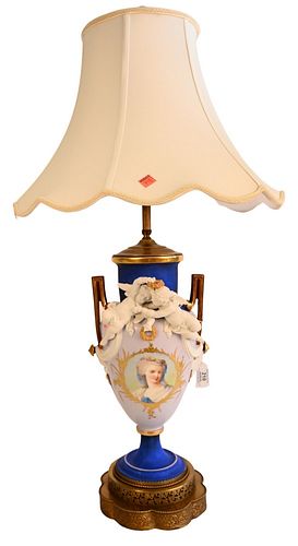 French Porcelain Figural Urn, having basalt putti figures with painted bust, made into a table lamp, vase height 15 inches, lamp height 35 inches.