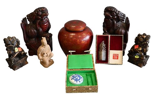 Eight Piece Chinese Lot, to include a pair of carved wooden foo dogs, a pair of soapstone foo dogs, terracotta kneeling army figure, wood painted lidd