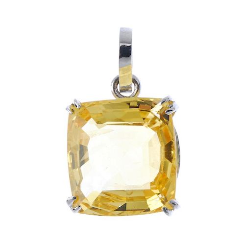 A sapphire single-stone pendant. The rectangular-shape yellow sapphire, weighing approximately 16cts