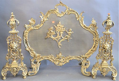 Three Piece Louis XV Style Fireplace Set, to include a screen with two mounted puttis along with a pair of andirons having mounted heads, height 28 in