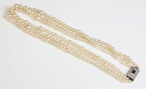 A three row graduated natural pearl necklace,with an