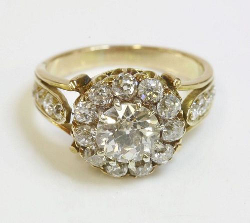 An Edwardian diamond cluster ring,with a central old