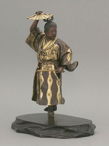 A gilt bronze Figure,20th century, in the form of a boy