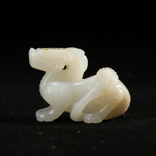 A WHITE JADE 'BEAST' CARVING