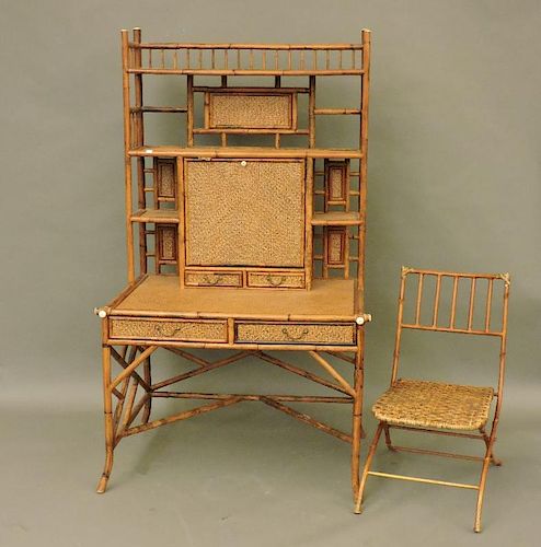A bamboo and wicker desk, by E Murio for Pied à Terre, labelled, with shelves flanking a hinged cupb
