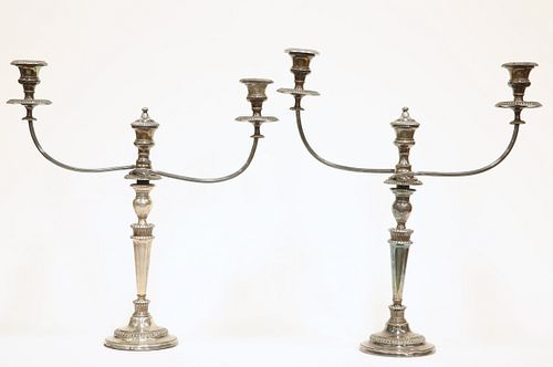 A PAIR OF OLD SHEFFIELD PLATE CANDELABRA, each with twin reeded scrolling b