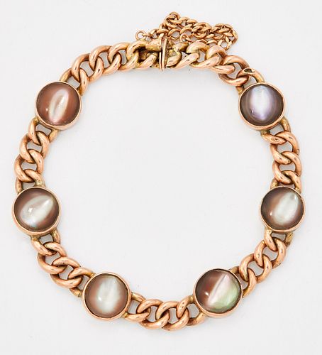 A MOTHER-OF-PEARL BRACELET, circular links inset with mother-of-pearl and s