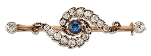 AN EARLY 20TH CENTURY SAPPHIRE AND DIAMOND BAR BROOCH, a round-cut sapphire