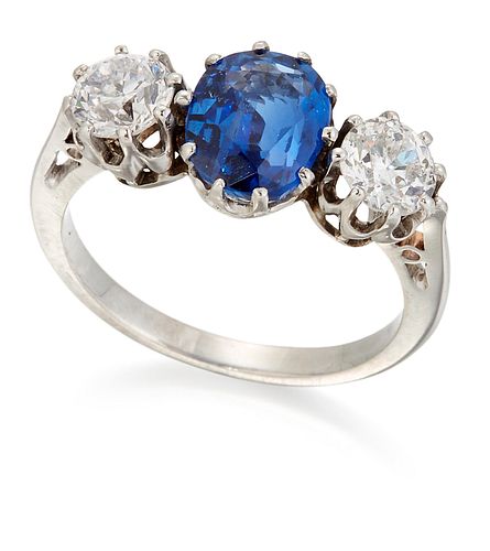 A SAPPHIRE AND DIAMOND THREE STONE RING, a cushion-cut sapphire between old
