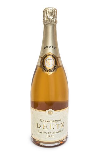 A bottle of Deutz Blanc de Blancs champagne, 1998.
Category: brut champagne. A.O.C. Reims.