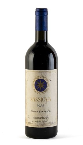 A bottle of Sassicaia Tenuta San Guido, vintage 1986.
Category: red wine. D.O.C. Bolgheri Sassicaia, Italy.
Level: B.
750 ml.