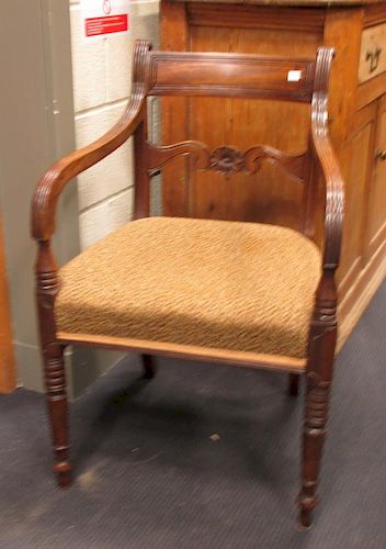 A set of eight Regency mahogany dining chairs including two elbow chairs (8) <br> <br>