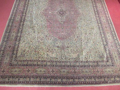 A tabriz carpet, green and pink, 420 x 290cm <br> <br>