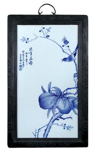 A Republic period blue on white plaque painted by Wang Bu (1896-1968), a bird calls from a branch wi