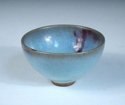 A jun glazed bowl, attributed to the Song dynasty, the lavender interior with two splashes of purple