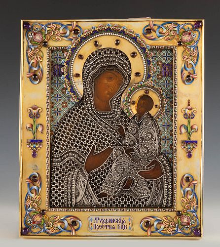 Russian school, ca. 1900.
"Mother of the God Tikhvinskaya".
Tempera and gold leaf on panel. Oklad in gilt silver and cloisonné enamel, with filigree a