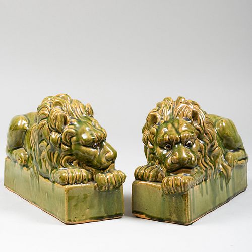 Pair of Green Glazed Models of Recumbant Lions