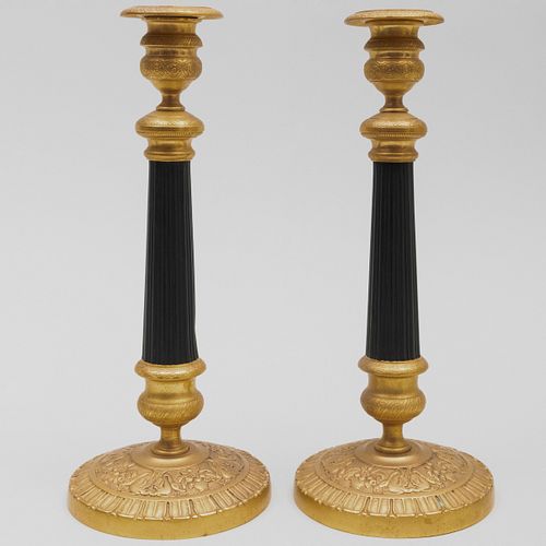Pair of Charles X Style Gilt-Metal and Patinated Metal Candlesticks