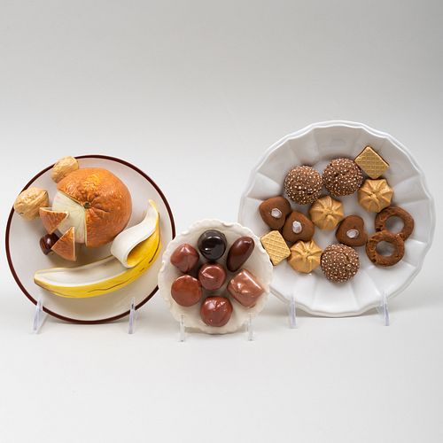 Group of Three Continental Ceramic Trompe L'Oeil Models of Dessert and Fruit on Plates