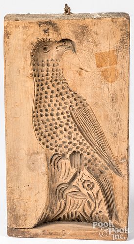 Carved parrot cookie board, 19th c.