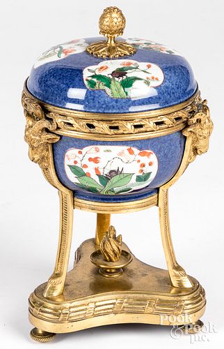 Continental brass and porcelain covered urn