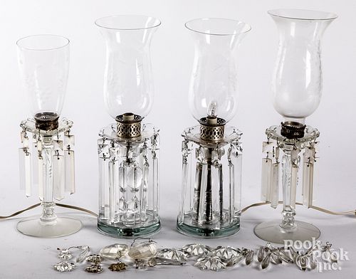 Two pairs of colorless glass mantel lamps