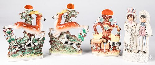 Group of Staffordshire spill vases and figures