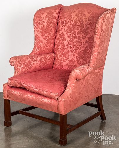 Chippendale style mahogany wing chair.