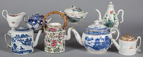 Eight Chinese export teapots and creamers