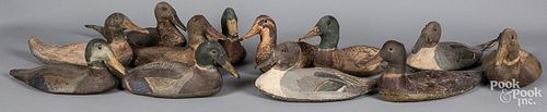 Twelve printed canvas covered duck decoys