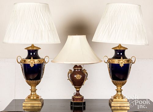 Three ormolu mounted table lamps.