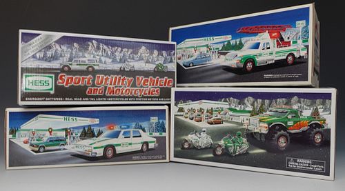 Four Hess Vehicle Toys