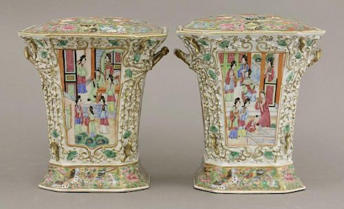 A pair of Canton enamel Bough Pots and Covers,<BR>c.1860, the panels of figures in interiors and in