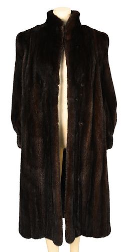 Brown Mink Full Length Coat, B. Smith and Sons, NY, having small stand up collar, banded cuffs and front slip pockets, fur is supple, size S/M.