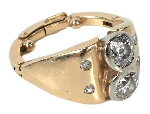 14 Karat Gold Diamond Ring, having two approximately 1/2 carat diamonds in the center with two small diamonds on each side, adjustable from size four 