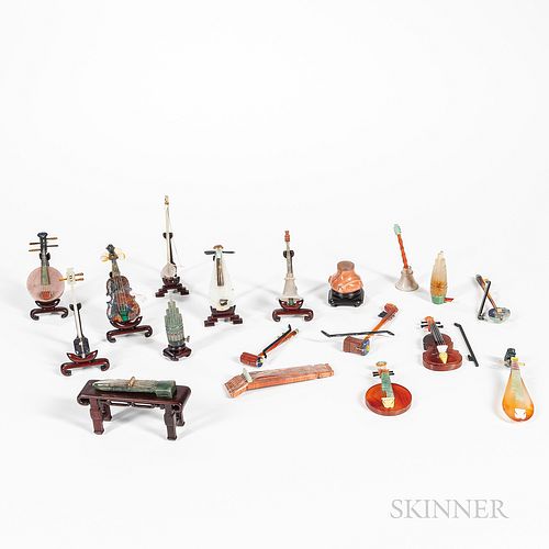Twenty Miniature Stone Carvings of Musical Instruments