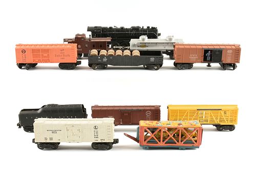 A GROUP OF ELEVEN LIONEL ELECTRIC TRAIN CARS, 736, 1004, 2671WX, 3464, 5576, 6454, 6457, 6462, 6465, 6472, 6656,