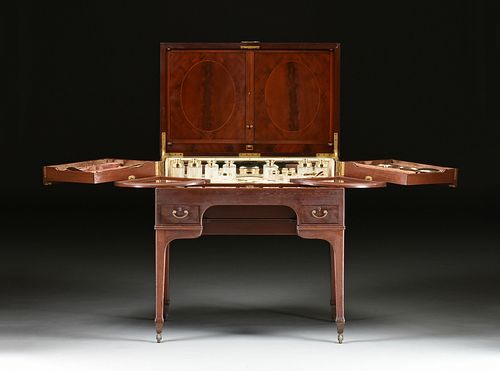 A GEORGE V MAHOGANY DRESSING TABLE AND STERLING SILVER TOILETTE SERVICE, BY GEORGE BETJEMANN AND SONS, RETAILED BY J.E. CALDWELL AND CO, EARLY 1920s,