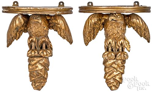 Pair of giltwood eagle wall brackets, early 19th c