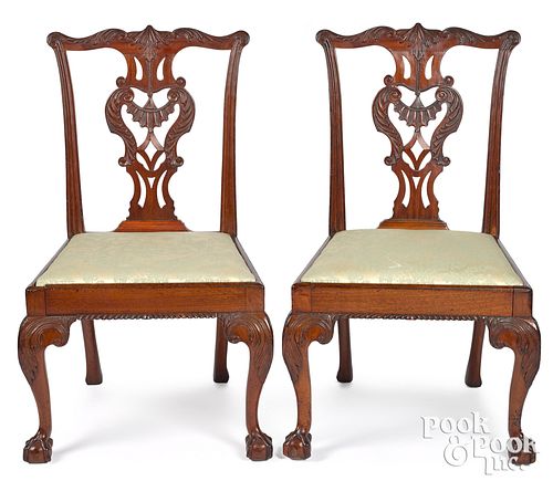 Pair of George III carved mahogany dining chairs