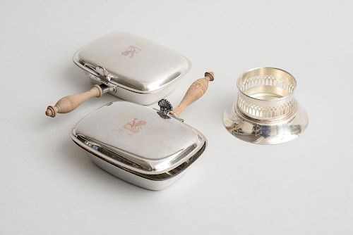 PAIR OF AMERICAN CRESTED SILVER-PLATED SILENT BUTLERS AND A KENNETH TURNER, LTD. SILVER-PLATED BOTTLE COASTER
