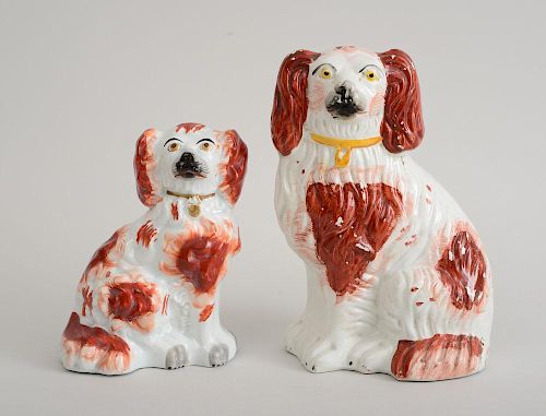 TWO STAFFORDSHIRE PEARLWARE FIGURES OF SEATED SPANIELS