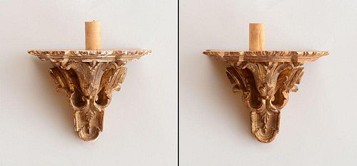 PAIR OF RÉGENCE STYLE CARVED GILTWOOD WALL BRACKETS