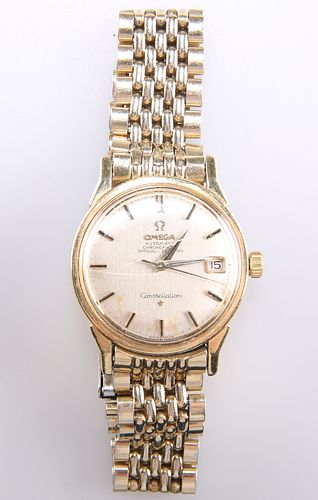 AN OMEGA CONSTELLATION BRACELET WATCH,?circular silver dial with black and 